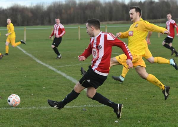 Wearside League club Sunderland West End (red/white) attack against Gateshead Rutherford in last week's Durham County Trophy tie. Picture by Kevin Brady