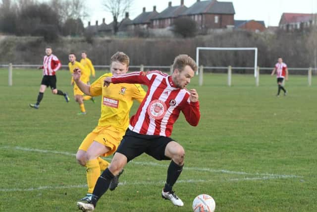 Sunderland West End (in red and white) in action against Gateshead Rutherford.