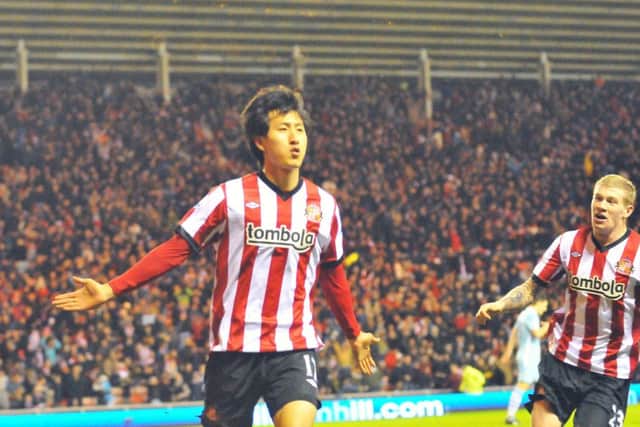 Ji Dong-Won runs to the Sunderland fans after scoring the winning goal against Manchester City. Picture by FRANK REID