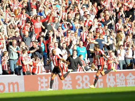 Fans celebrate Jermain Defoe's stunning derby winner against Newcastle United.