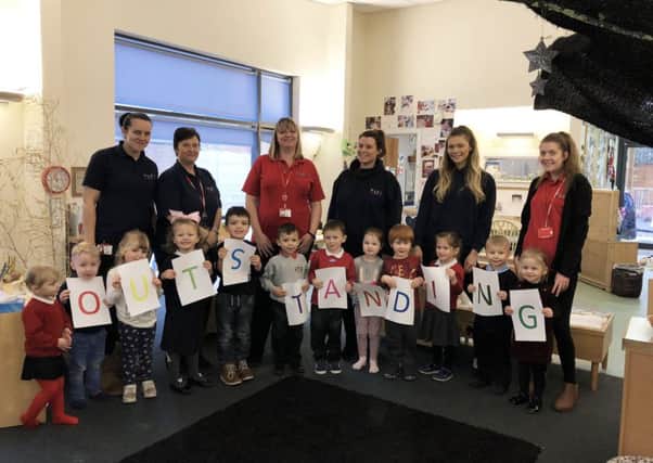 Staff and children at Springboard Nursery in Sunderland.
