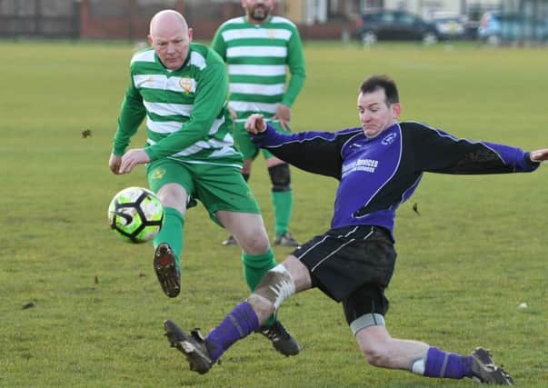 Peterlee Helford United (purple) take on Hartlepool Catholic Club last weekend.