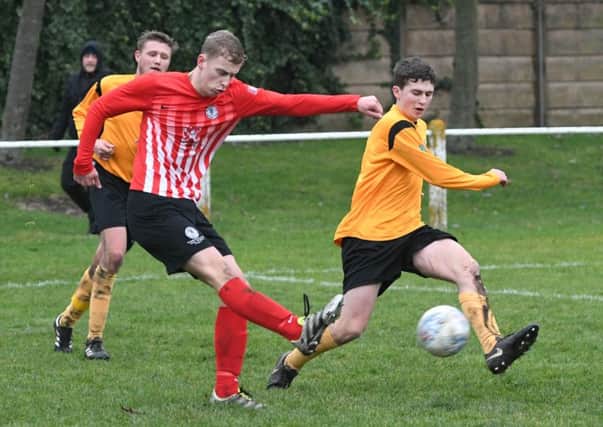 Silksworth CW (red/white) fire in a shot against Annfield Plain on Saturday. Picture by Kevin Brady