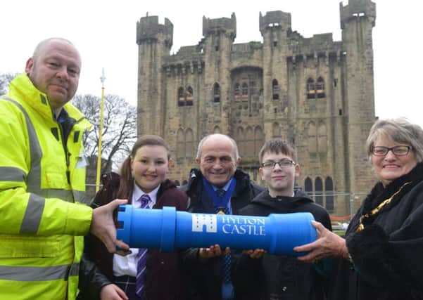 Hylton Castle time capsule from school children and local community.
Sunderland mayor Coun Doris MacKnight hands over the capsule to John Hutton from William Birch contactors. School children Lewis Foster, 14 and Paige Thurlbeck, 13 from Castle View Enterprise Academy with moayor consort Keith MacKnight