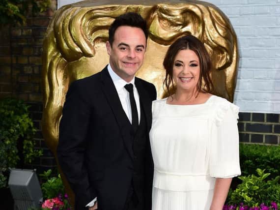 Ant McPartlin and wife Lisa Armstrong, who are to split after 11 years of marriage. Pic: PA.