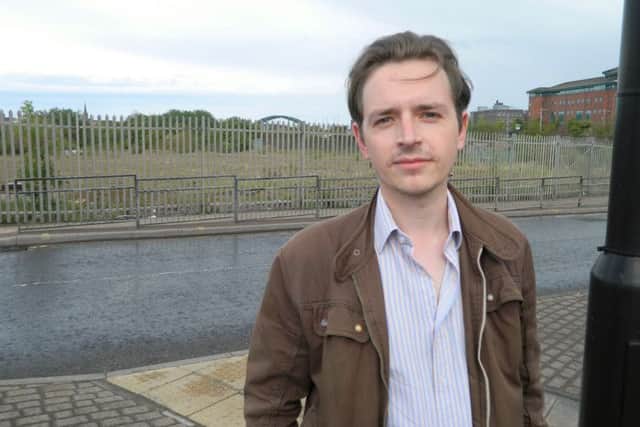 Liberal Democrat Councillor Niall Hodson in front of the Farringdon Row site in Sunderland city centre.