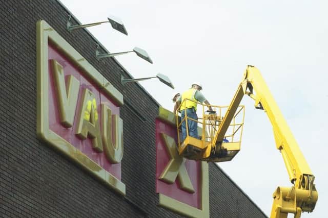 Demolition work sees the brewery's iconic sign removed