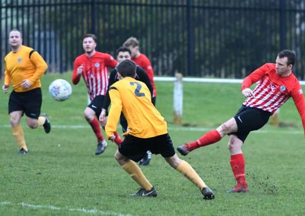 Silksworth CW (red/white) shoot for goal in last week's win over Annfield Plain. Picture by Kevin Brady