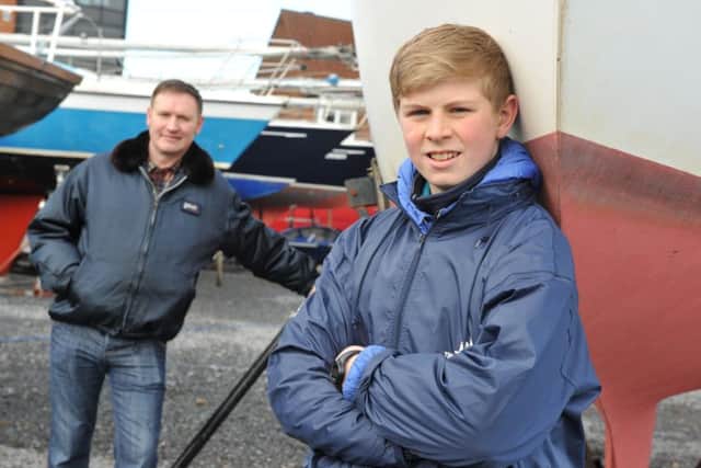 Tall Ships Race trainee Liam Malyan with dad Scott, at Sunderland Yacht Club.
