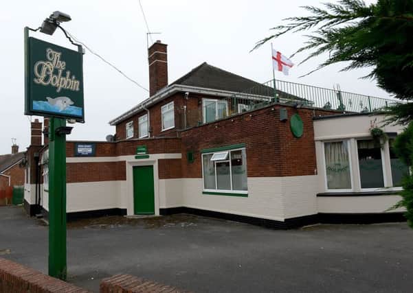 The stabbing took place outside The Dolphin pub