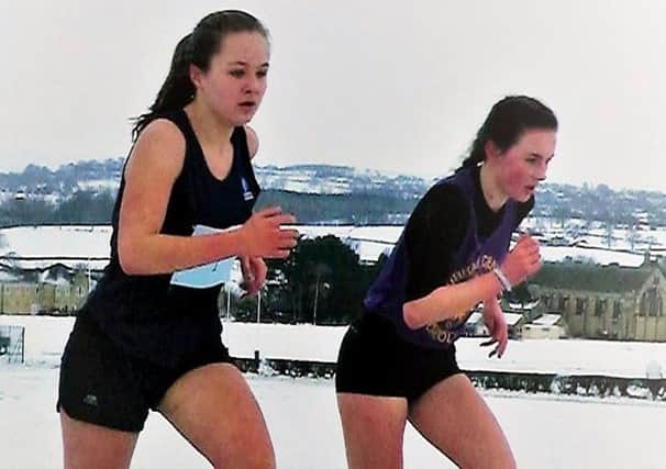 Eva Hardie and Anna Pigford, who finished fifth and fourth respectively in the intermediate girls race at the County Schools Championships at Barnard Castle.
