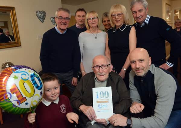 War veteran George "Sid" Elliott celebrates his 100th birthday with his family