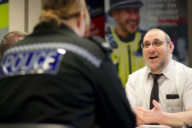 Jewish faith leader Ben Roth chats to one of Northumbria Police's new officers.