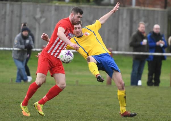 Ryhope CW (red) battle against Sunderland RCA in Division One last week. Picture by Kevin Brady