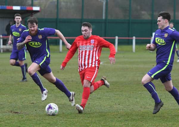 Seaham Red Star (red/white) attack against Ryhope CW on Saturday. Picture by Kevin Brady