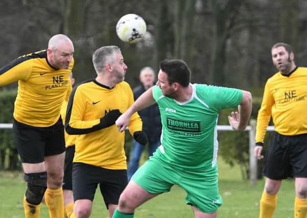 Over-40s action as Penshaw Catholic Club  (yellow) scrap against Thornley Celtic last week. Picture by Kevin Brady