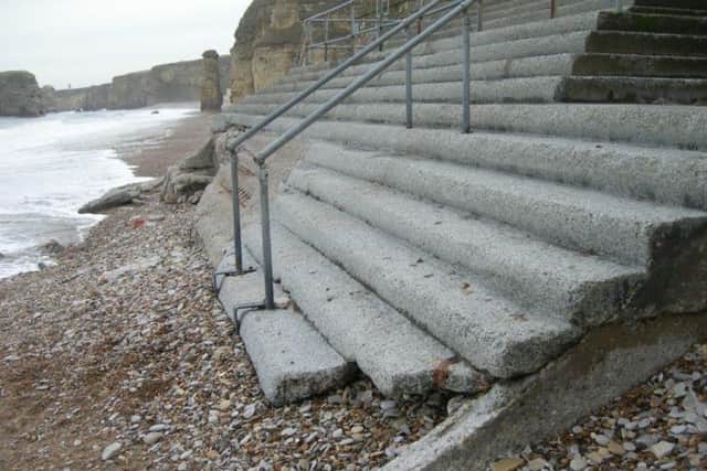 The steps before the damaged area was removed. Photo by Mick Simpson.