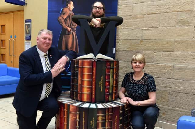 Matilda book cake statue. From left Coun John Kelly, Empire learning officer Anthony Hope and Sunderland's library Sue Potts