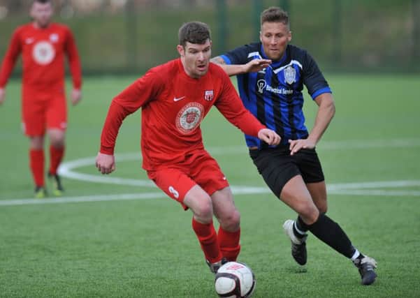 Durham Sunday Cup quarter-final between Victoria Gardens (red) and Peterlee Catholic Club. Picture by Tim Richardson