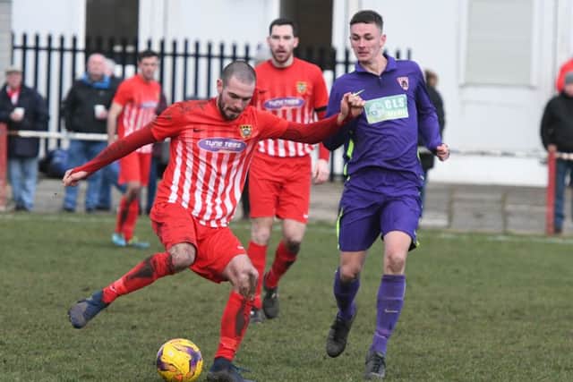 Ryhope CW striker Josh Home-Jackson lines up a shot against Guisborough. Picture by Kevin Brady