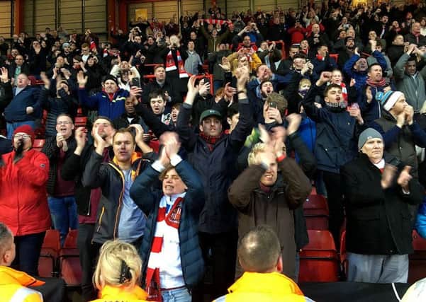 Sunderland fans celebrate Saturday's point-saving comeback at Bristol City. Picture by Frank Reid