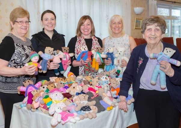From left Glynn Nishimura (Gentoo resident and knitter), Michelle Miller (Acting Inspector, Northumbria Police), Lucy Malarkey (Deputy Director, Operations, Gentoo), Ann Donkin (Community Partnerships Coordinator, Gentoo), Hilda Smith (Gentoo resident and knitter).