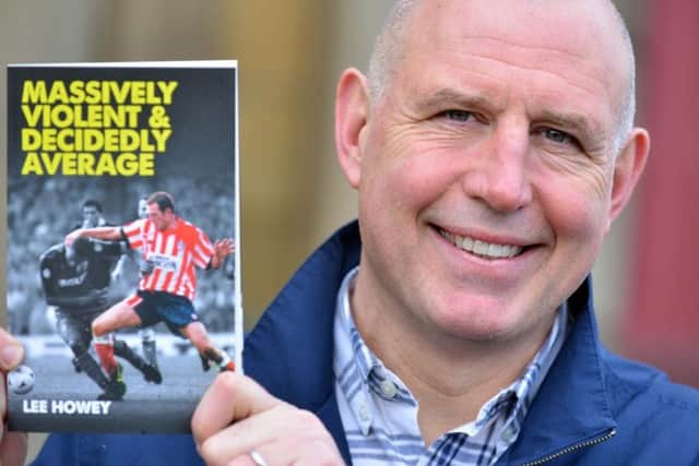 Former Sunderland footballer Lee Howey with a copy of his new book.