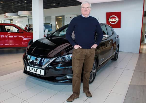 Leo Moran takes delivery of his new Nissan Leaf