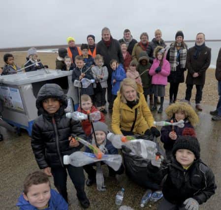 Sunderland Councillors join beach cleaning pupils from Dame Dorothy Primary School to celebrate the arrival of recycling facilities along Roker beach.