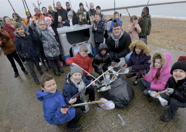 Sunderland Councillors join beach cleaning pupils from Dame Dorothy Primary School to celebrate the arrival of recycling facilities along Roker beach.