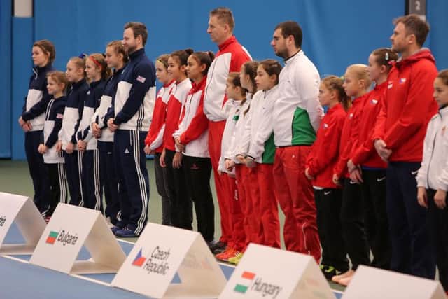 The teams line up for the opening ceremony at Sunderland Tennis Centre, with Great Britain on the far left. Picture by Tom Banks