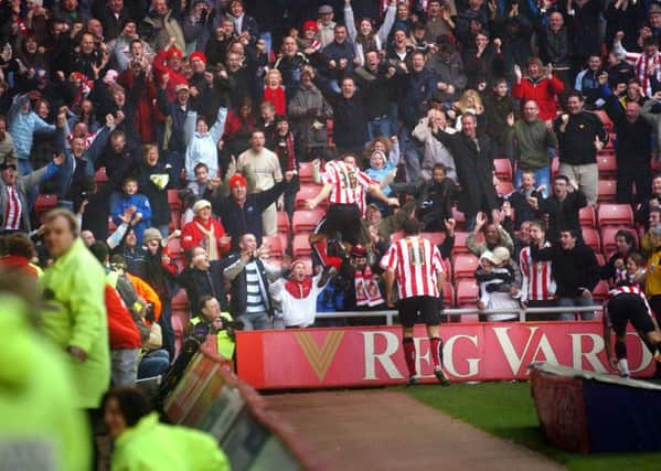 Liam Miller launches himself into the crowd after his late winner against Derby in 2007.