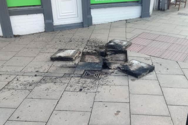 Damage was caused to paving stones after the explosion.