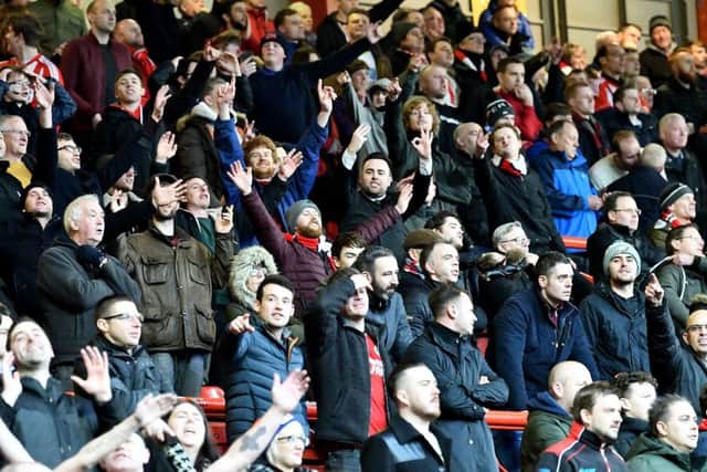 Sunderland fans celebrate at Ashton Gate.