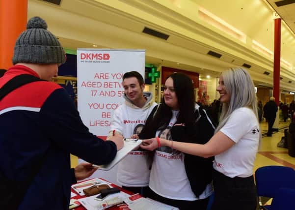 The family and friends of Chloe Gray together with DKMS Charity, asking people to sign up as potential stem cell doners, in The Bridges on Tuesday. Pictured l-r are Jason Gray (Chloe's uncle) Francesca Bowser (Chloe's mum) and nurse Danielle Hardy.