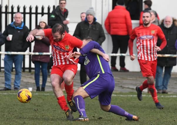 Ryhope CW (red/white) take on Guisborough Town last week. Picture by Kevin Brady