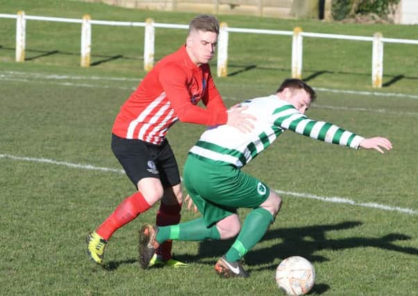 Silksworth CW (red/white) take on Cleator Moor Celtic in the Wearside League last week. Picture by Kevin Brady
