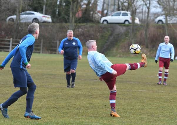 Over-40s action as Wearmouth CW (light blue) take on Washington Victoria Inn last weekend. Picture by Kevin Brady