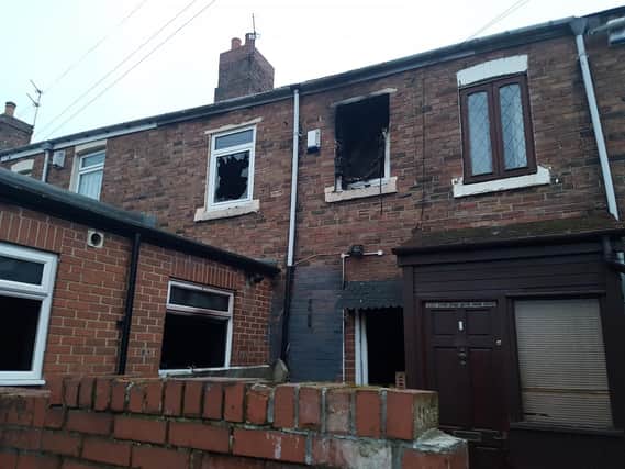 The house in Edward Street was severely damaged in the fire, which broke out at about 1pm.