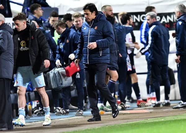 Sunderland boss Chris Coleman trudges back to the dressing room after last night's defeat. Picture by Frank Reid