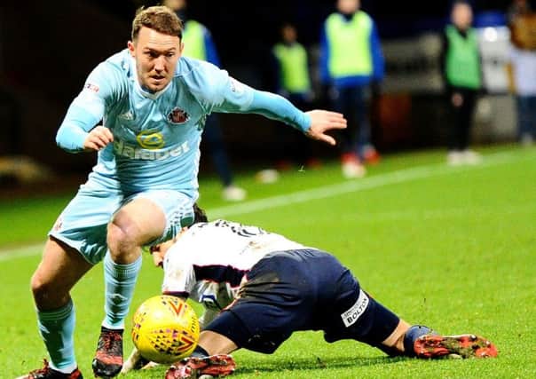 Sunderland sub Aiden McGeady beats his man as he tries to create a late chance in last night's defeat at Bolton. Picture by Frank Reid