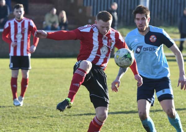 Sunderland RCA (red/white) battle to victory against North Shields last weekend. Picture by Kevin Brady