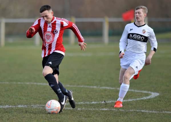 Wearside League action as Sunderland West End (red/white) take on Coxhoe Athletic last week. Picture by Tim Richardson