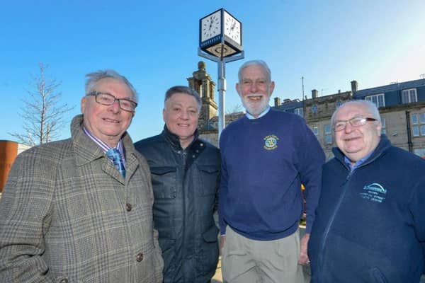 Cabinet Secretary Councillor Mel Speding (2nd left) with Rotary Club members John Clark, Tony Everett and Derek Sheriff with the relocated clock