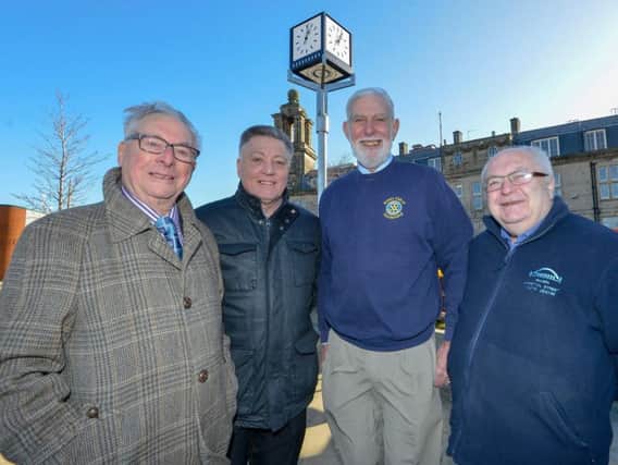 Cabinet Secretary Councillor Mel Speding (2nd left) with Rotary Club members John Clark, Tony Everett and Derek Sheriff with the relocated clock