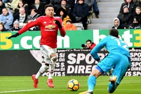 Martin Dubravka dives at the feet of Jesse Lingard in Newcastle's win over Manchester United a fortnight ago. Picture by Frank Reid