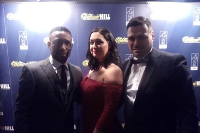 Jermain Defoe pictured with Bradley Lowery's parents Gemma and Carl.
