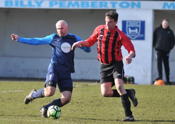 Wearmouth CW (blue) take on Spennymoor Town in the Over-40s League last week. Picture by Tim Richardson