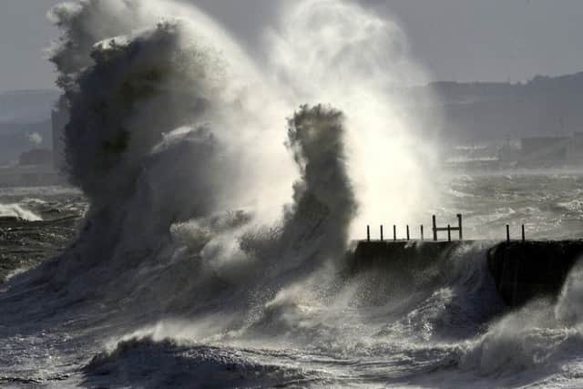 Huge North Sea waves crash against the Heugh Breakwater at the Headland, Hartlepool.  Pic by Tom Collins.