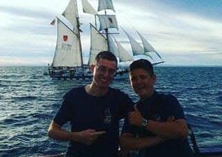 Chris Dow, right, poses for a photo with a Tall Ship colleague.
